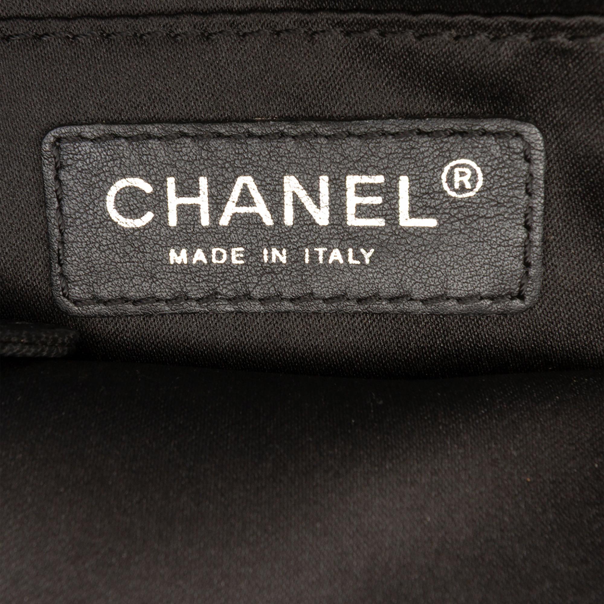 Chanel Medium Quilted Lambskin Clams Pocket Flap