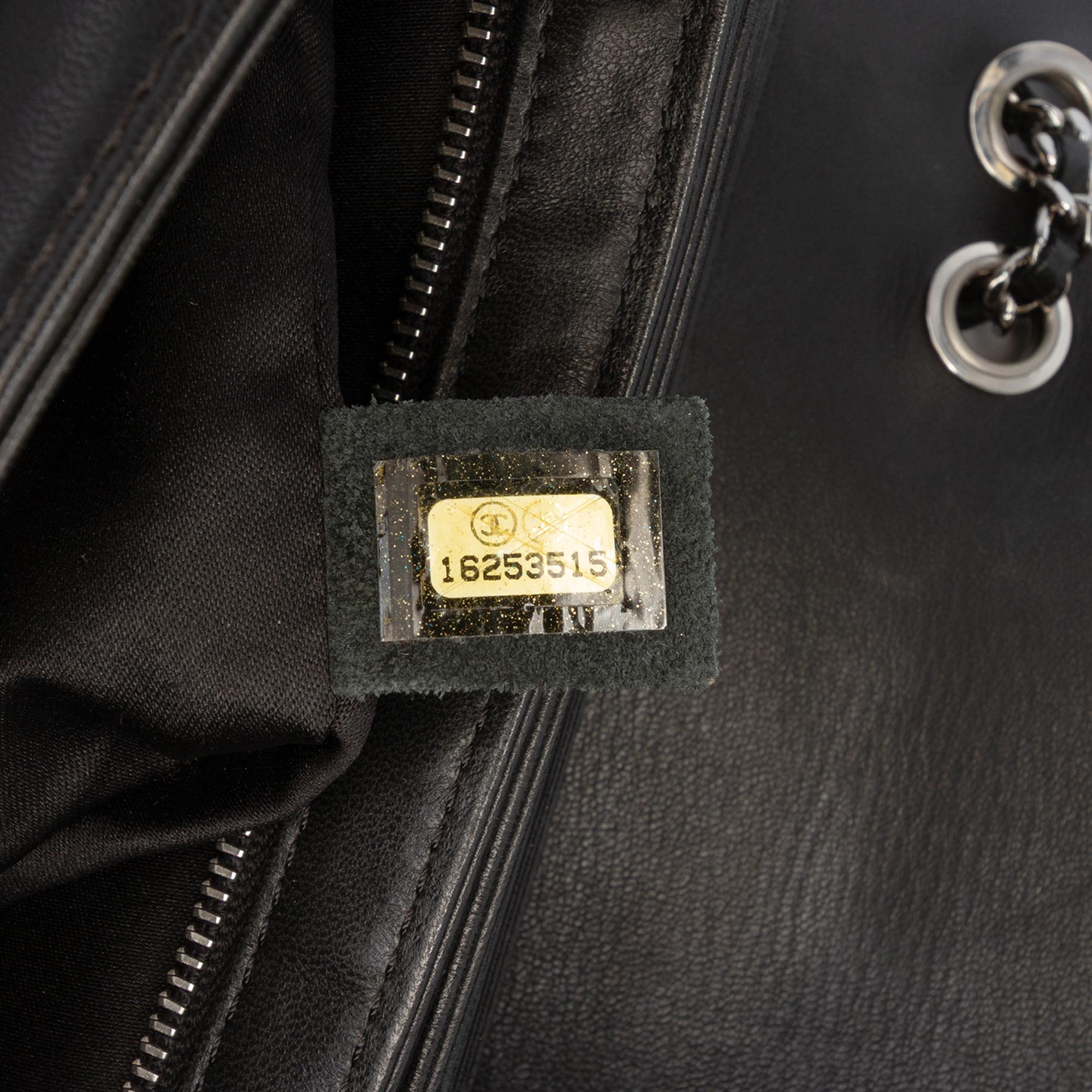 Chanel Medium Quilted Lambskin Clams Pocket Flap