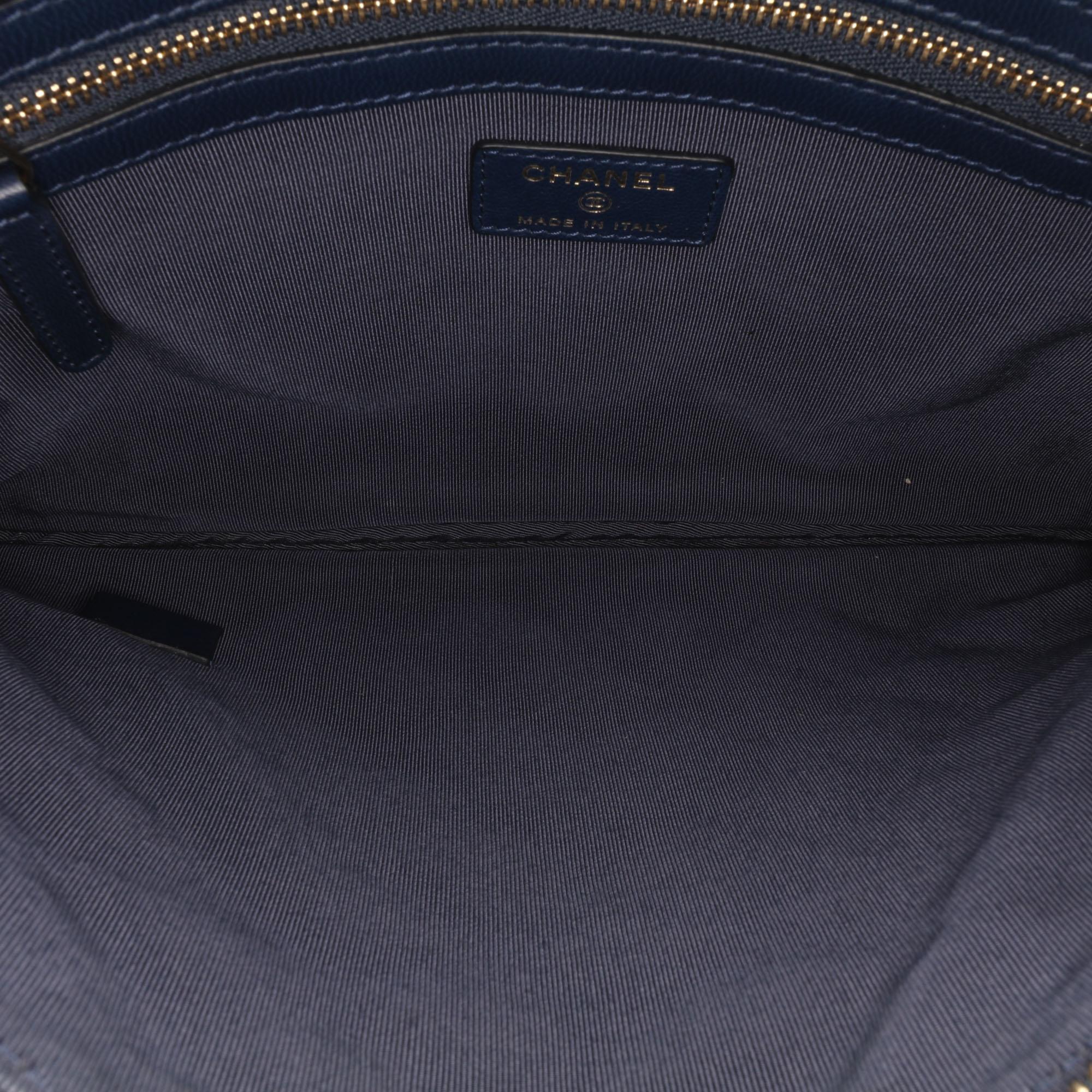 Chanel Medium Quilted Lambskin O Case Clutch