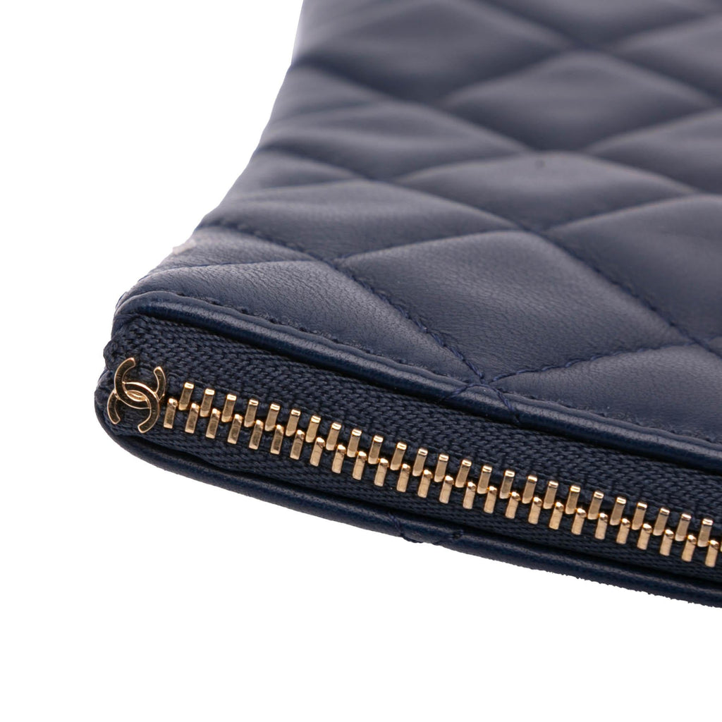 Chanel Medium Quilted Lambskin O Case Clutch