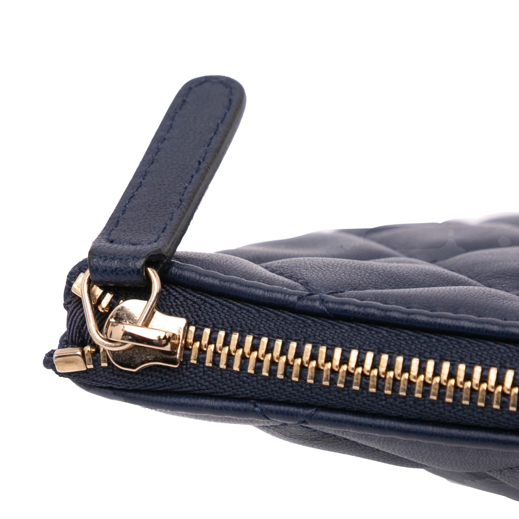 Chanel Medium Quilted Lambskin O Case Clutch