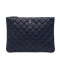 Chanel Medium Quilted Lambskin O Case Clutch