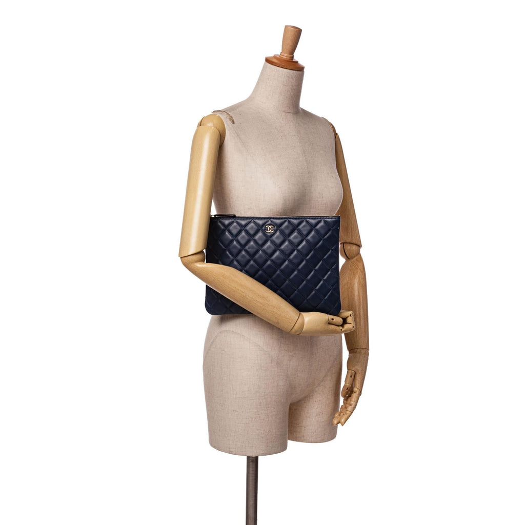 Chanel Medium Quilted Lambskin O Case Clutch