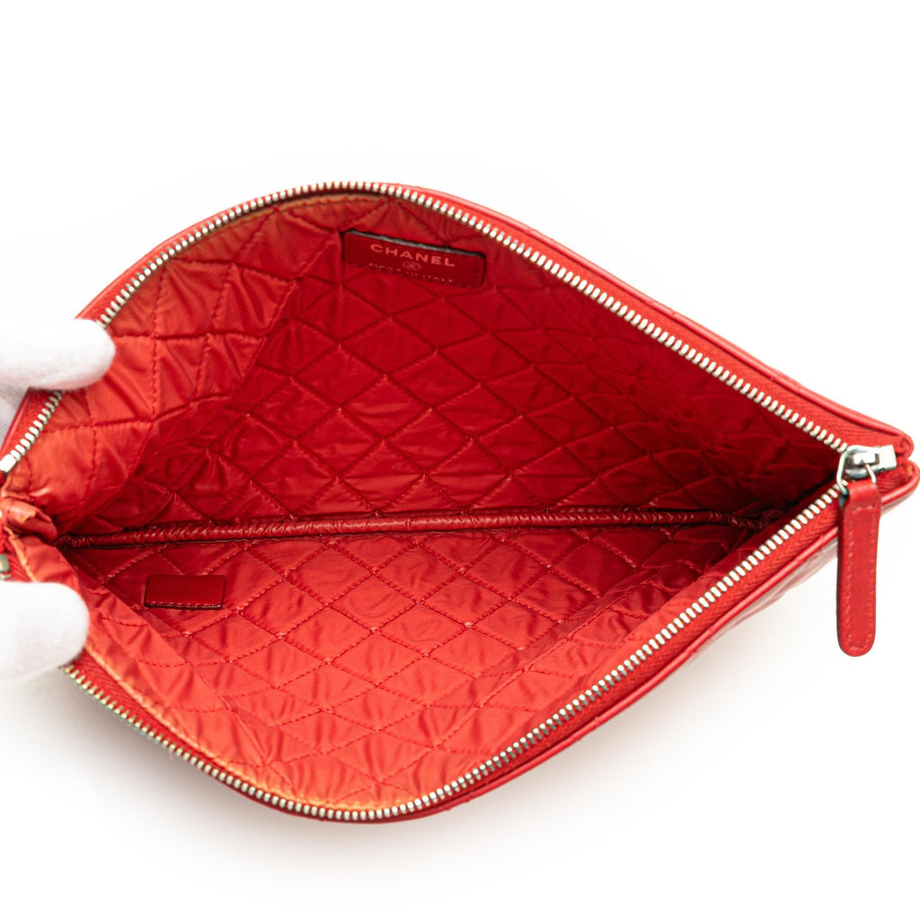 Chanel Medium Quilted Lambskin O Case Clutch
