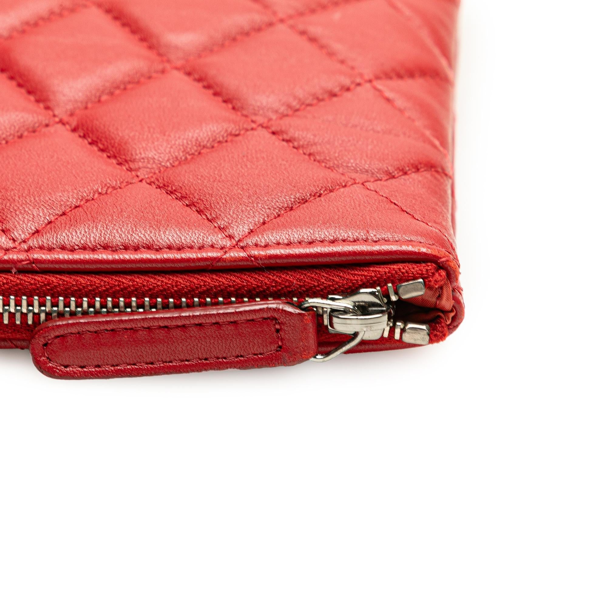 Chanel Medium Quilted Lambskin O Case Clutch