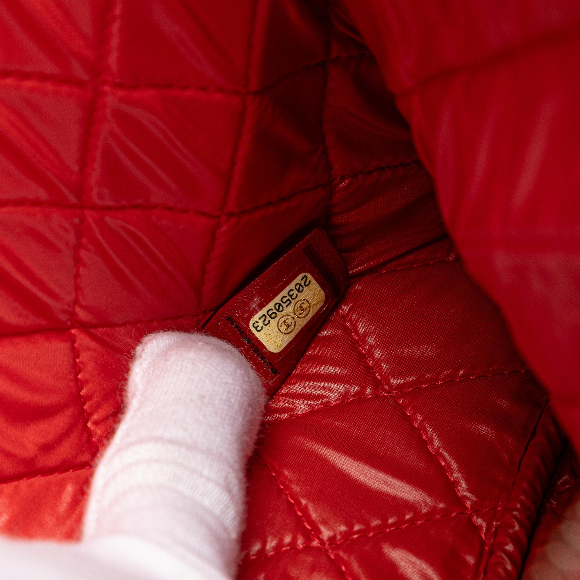 Chanel Medium Quilted Lambskin O Case Clutch