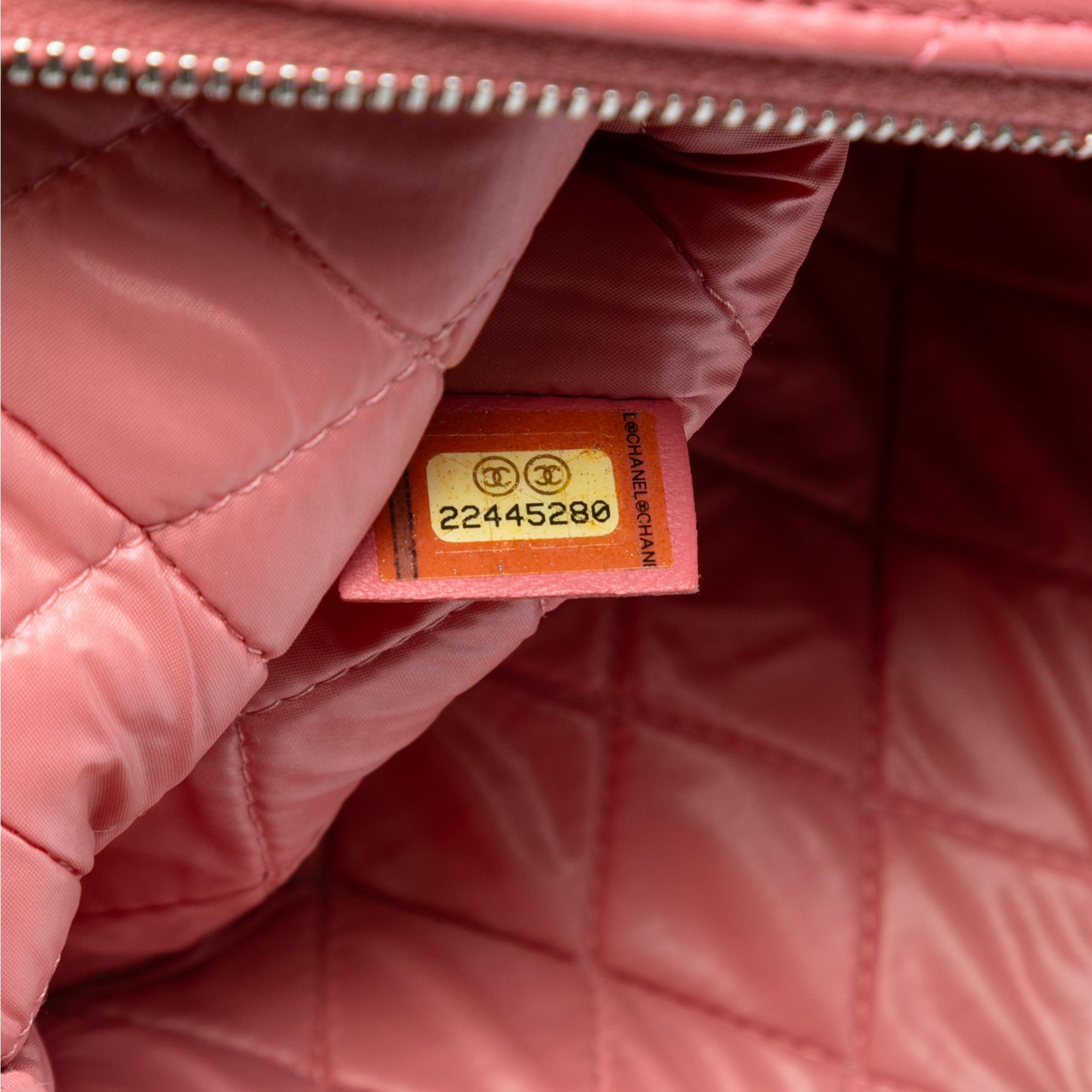 Chanel Medium Quilted Lambskin O Case Clutch