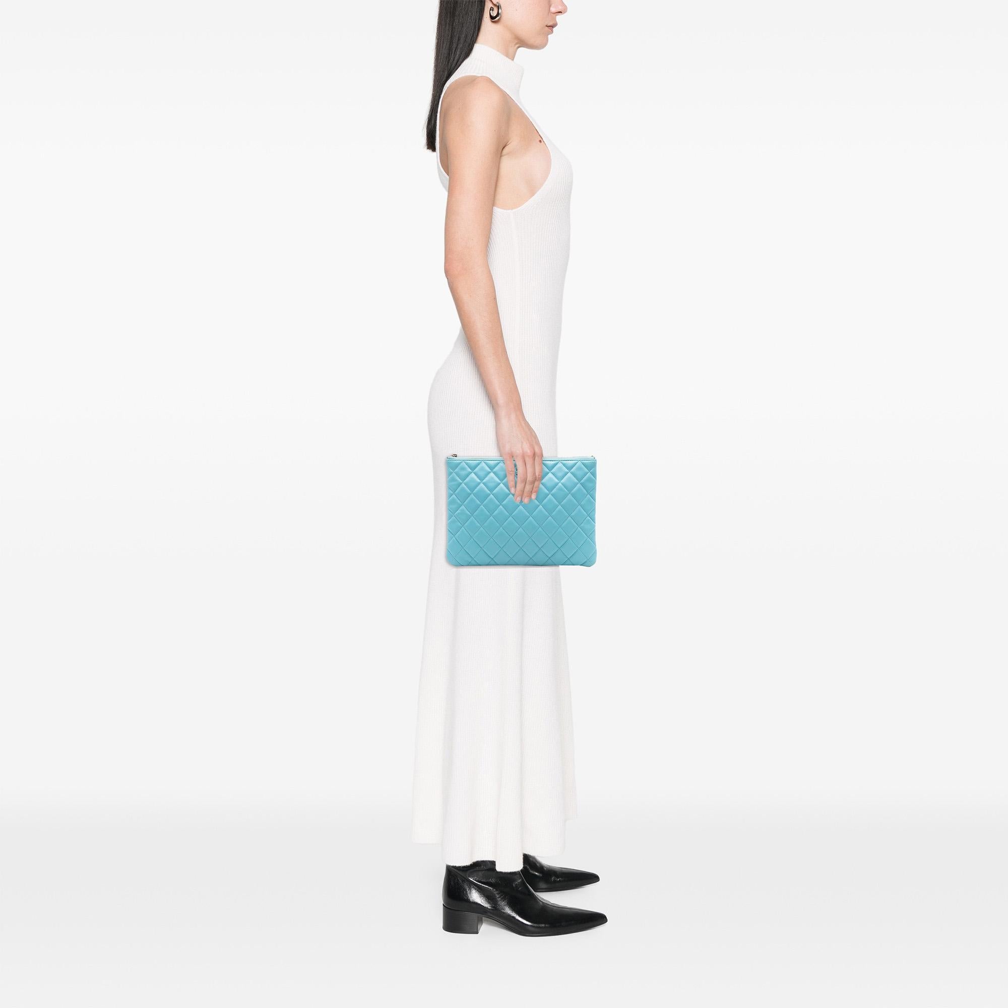 Chanel Medium Quilted Lambskin O Case Clutch