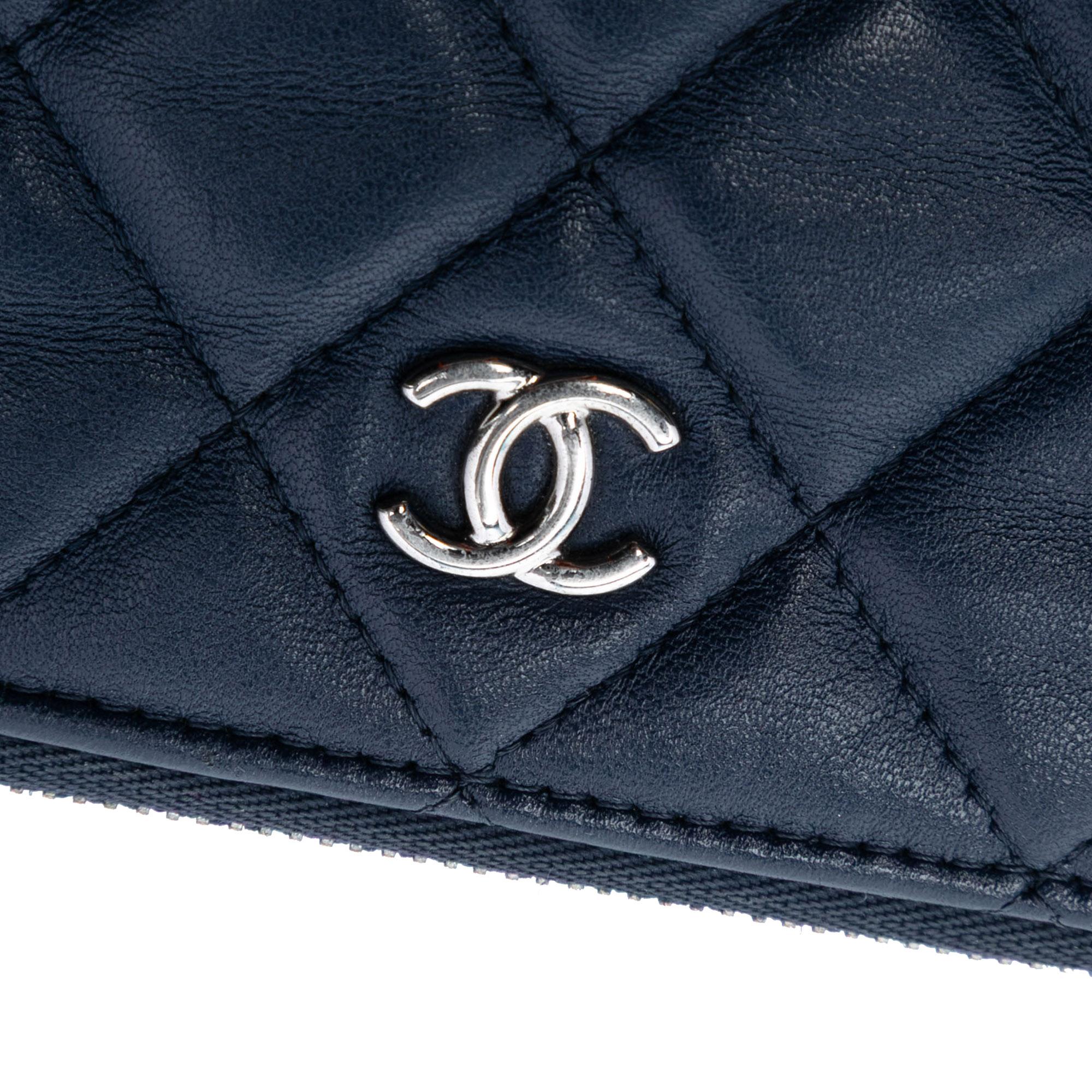 Chanel Medium Quilted Lambskin O Case Clutch