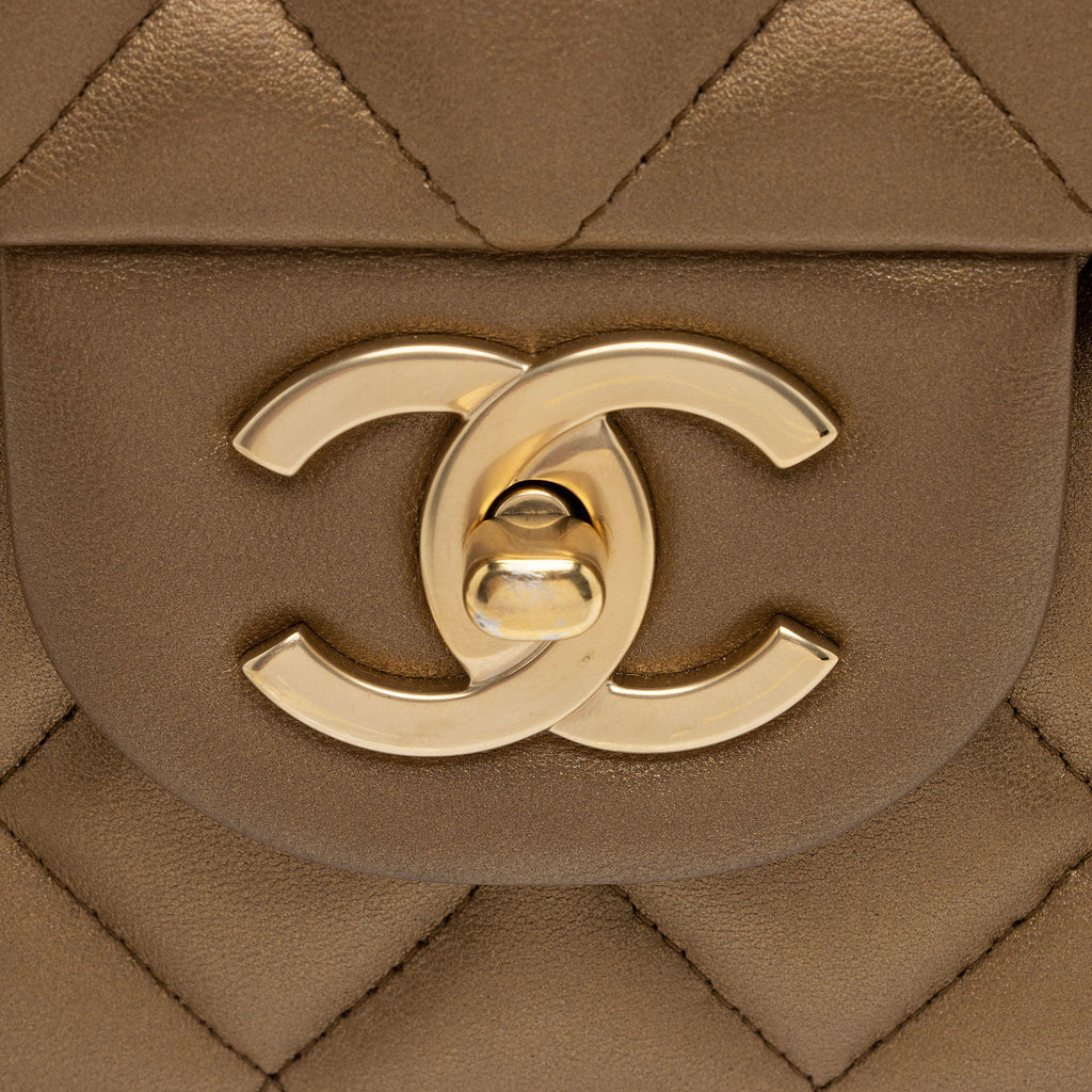 Chanel Metallic Lambskin Classic Maxi Double Flap Bag (SHF-kjT4fr)