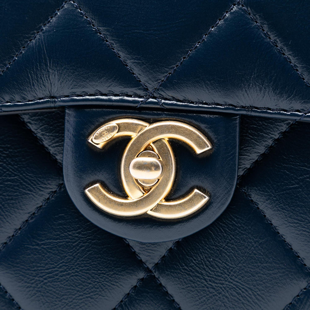 Chanel Mini CC Quilted Shiny Calfskin Round Moon Messenger Flap