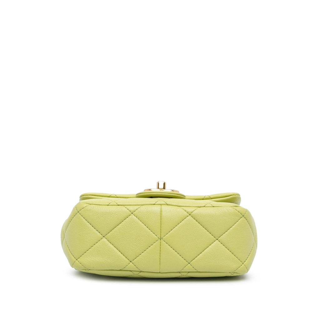 Chanel Mini Quilted Lambskin Oval Logo Chain Top Handle Flap