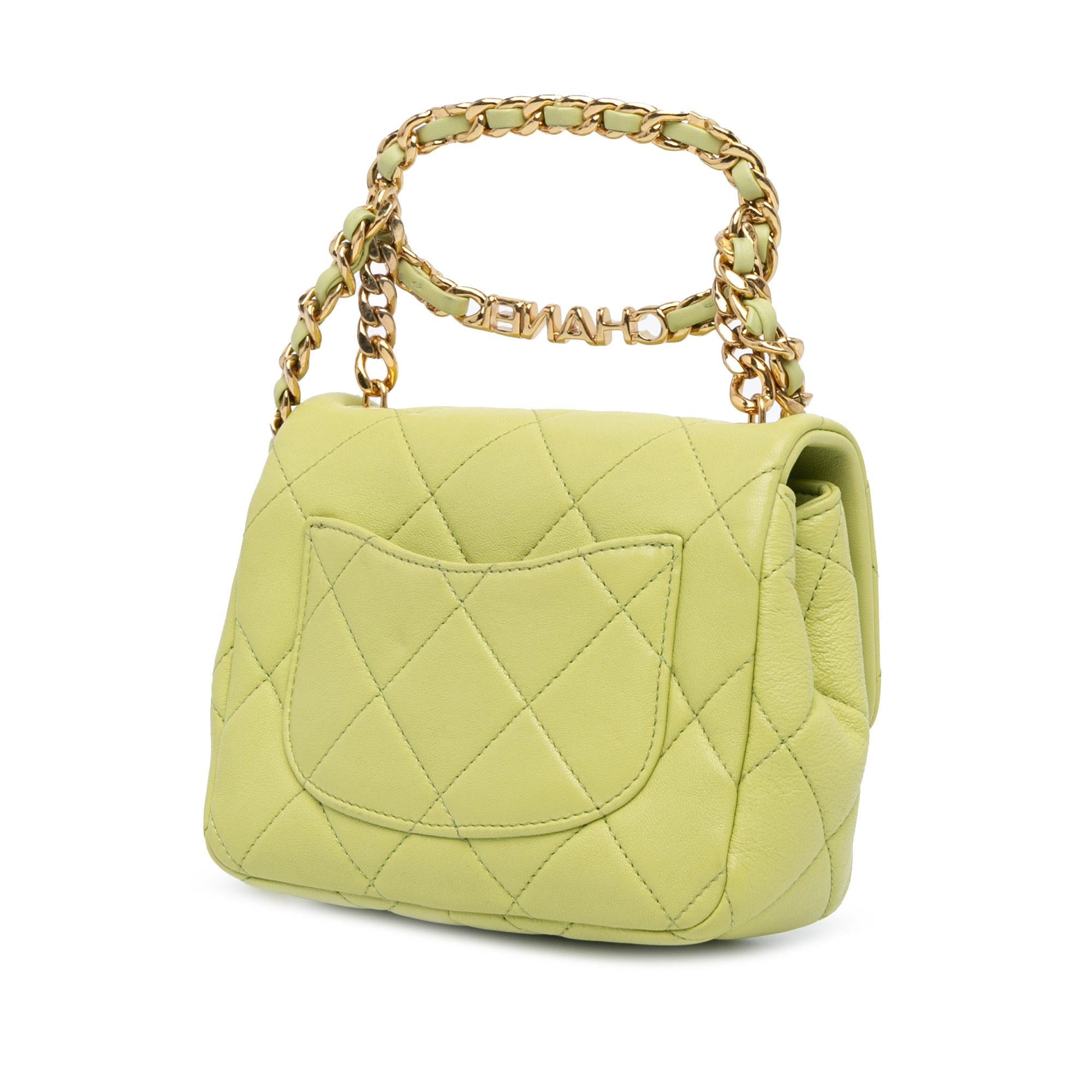 Chanel Mini Quilted Lambskin Oval Logo Chain Top Handle Flap