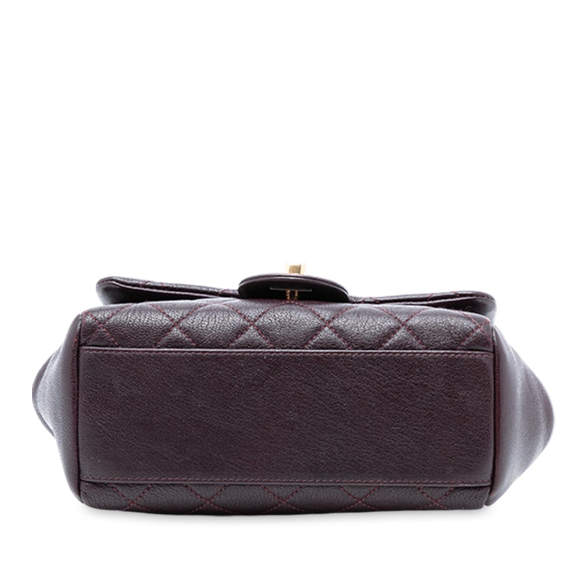 Chanel Mini Quilted Sheepskin Trapezio Flap