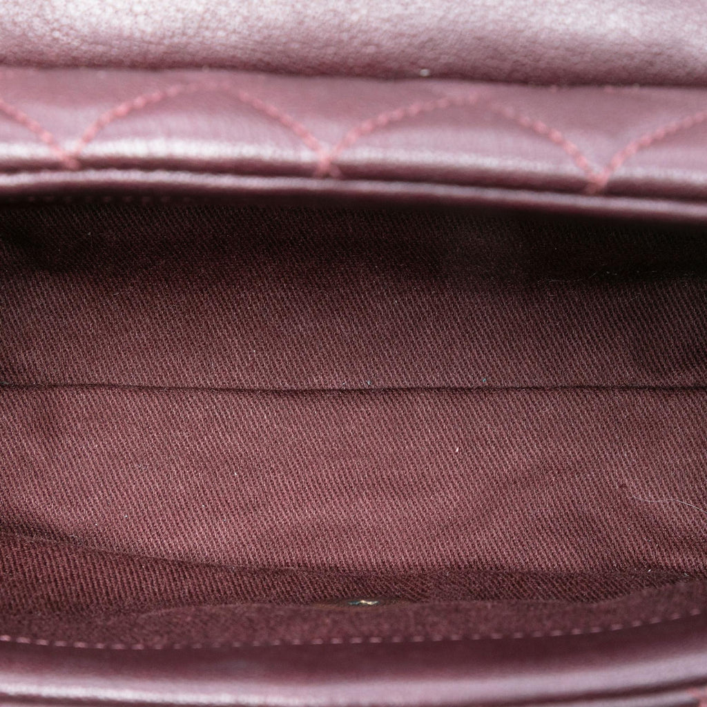 Chanel Mini Quilted Sheepskin Trapezio Flap