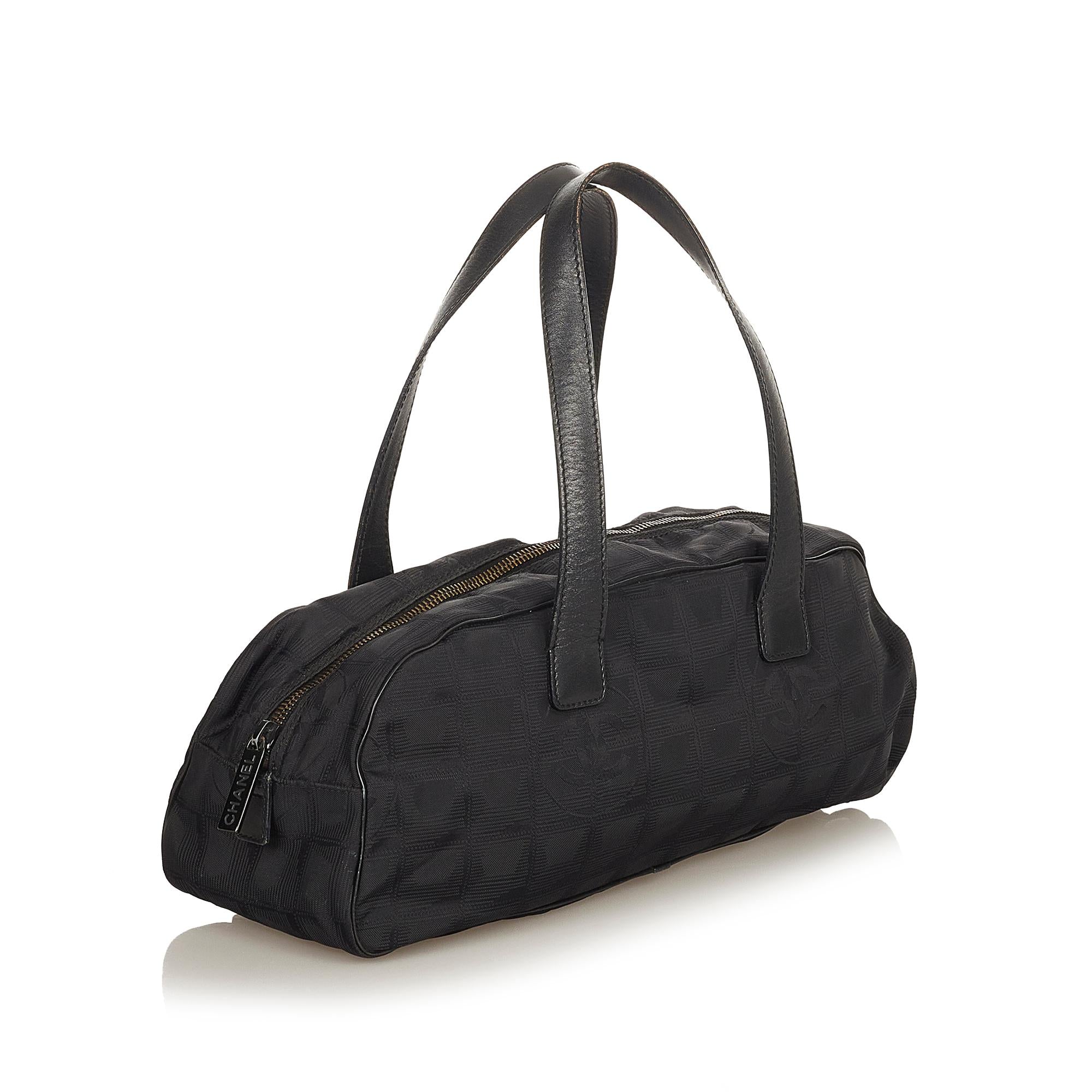 Chanel New Travel Line Canvas Handbag (SHG-25650)