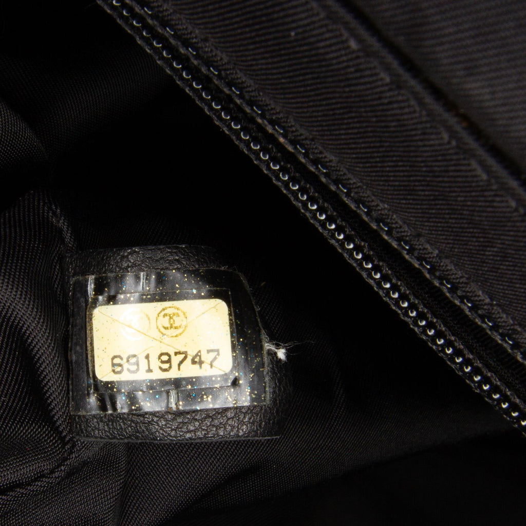 Chanel New Travel Line Convertible Backpack (SHG-Kjmrgc)