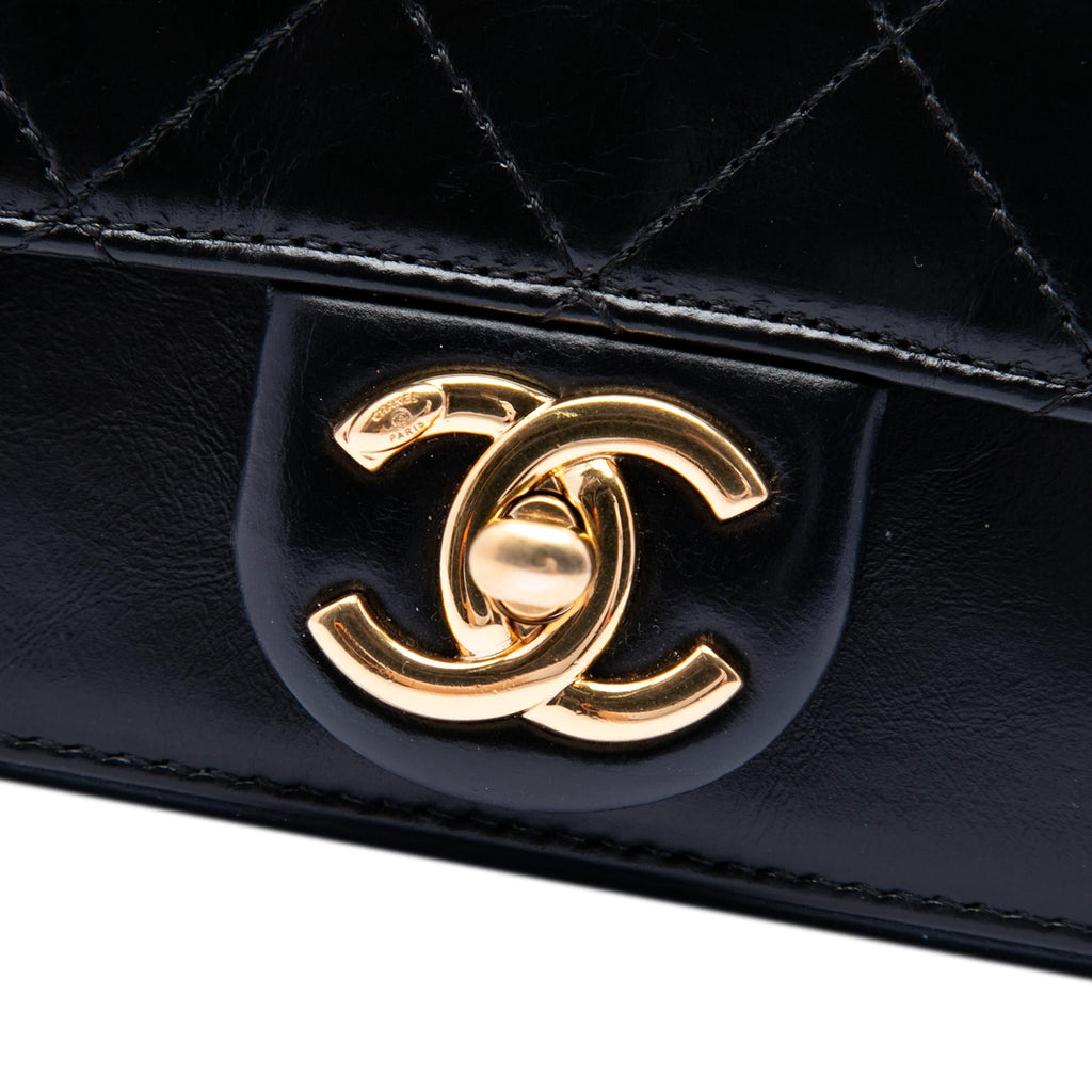 Chanel Paris Cosmopolite Mini Aged Calfskin Straight Lined Flap