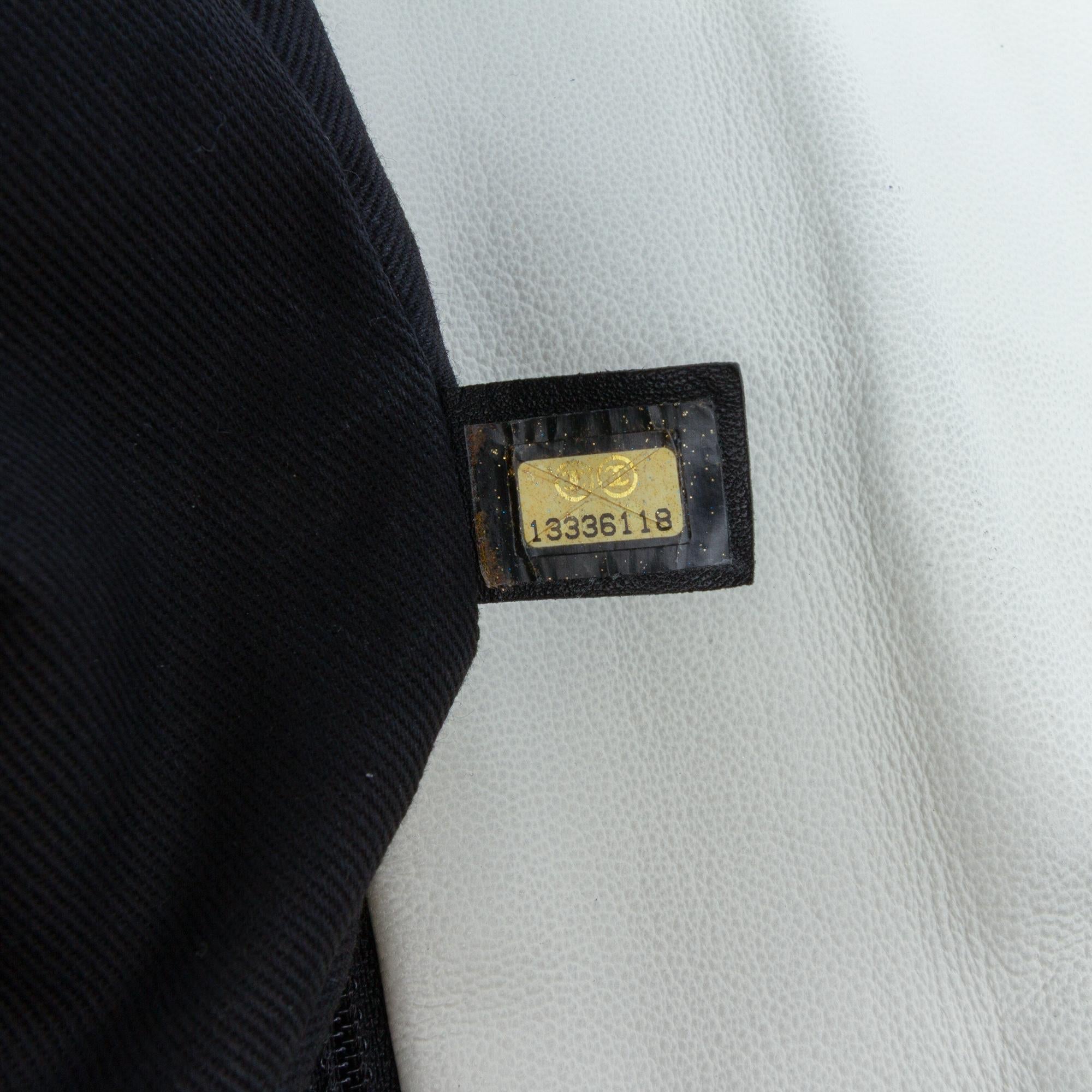 Chanel Quilted Calfskin Expandable Zip Yacht Flap