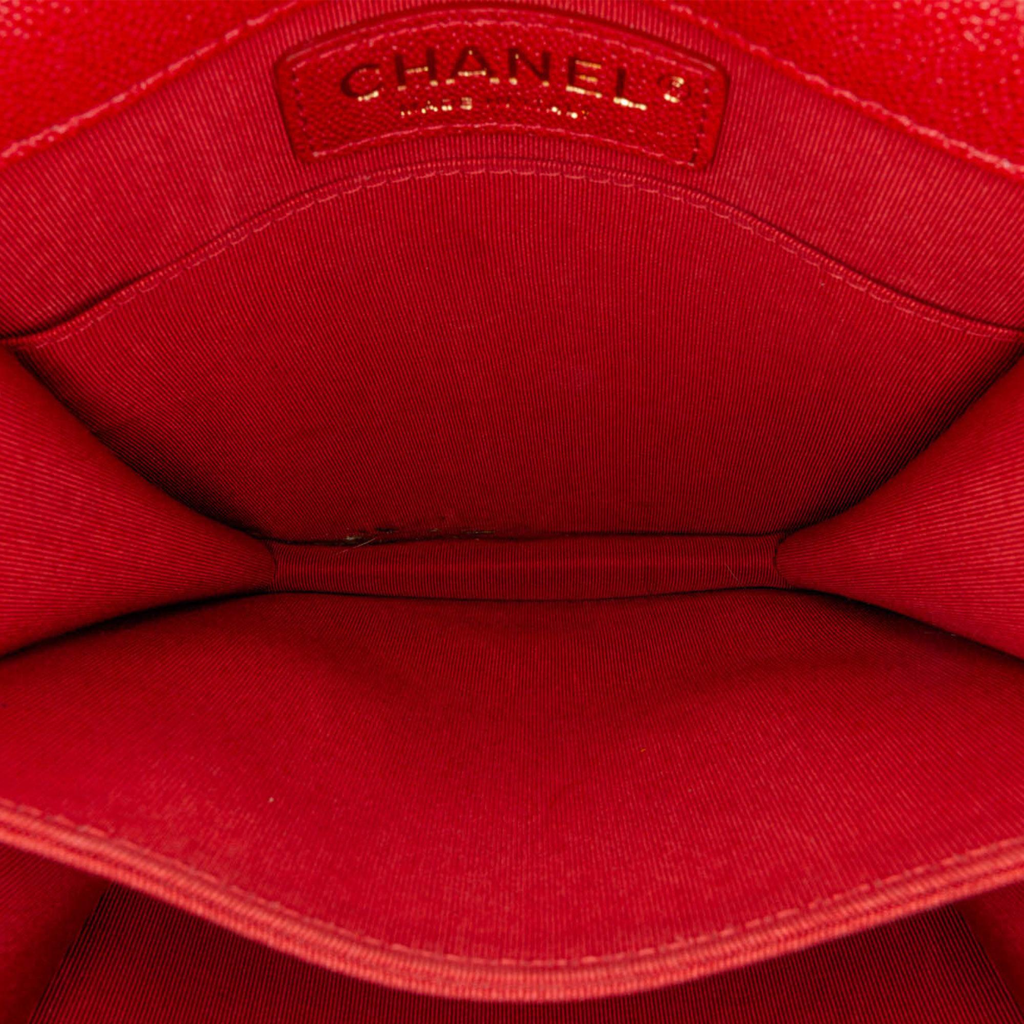 Chanel Quilted Caviar North South Boy Flap