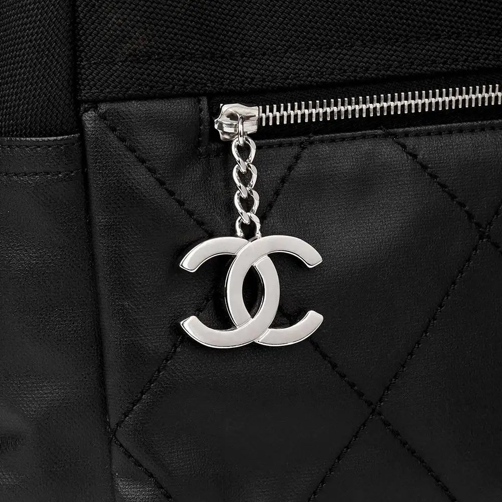 CHANEL PARIS BIARRITZ CC QUILTED COATED CANVAS BACKPACK