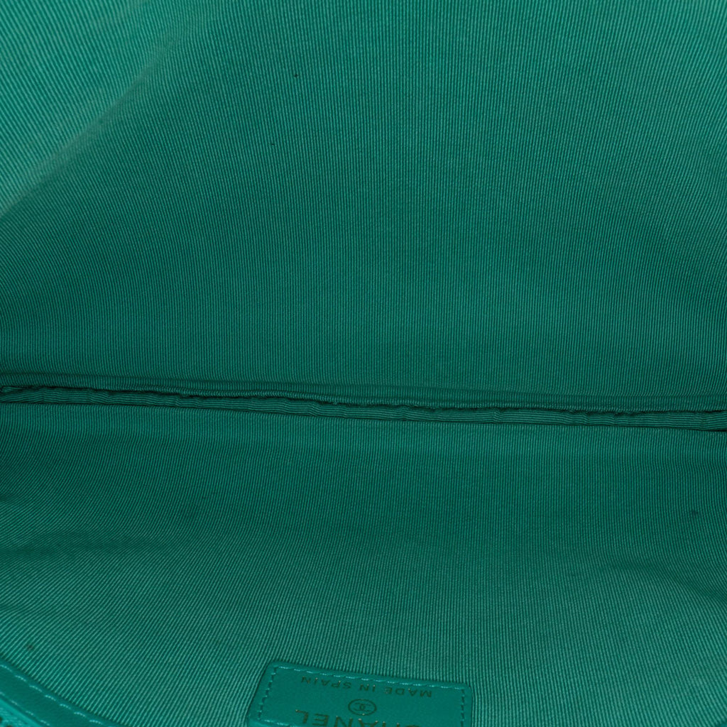 Chanel Quilted Lambskin O-Case Clutch (SHG-2sVTGN)