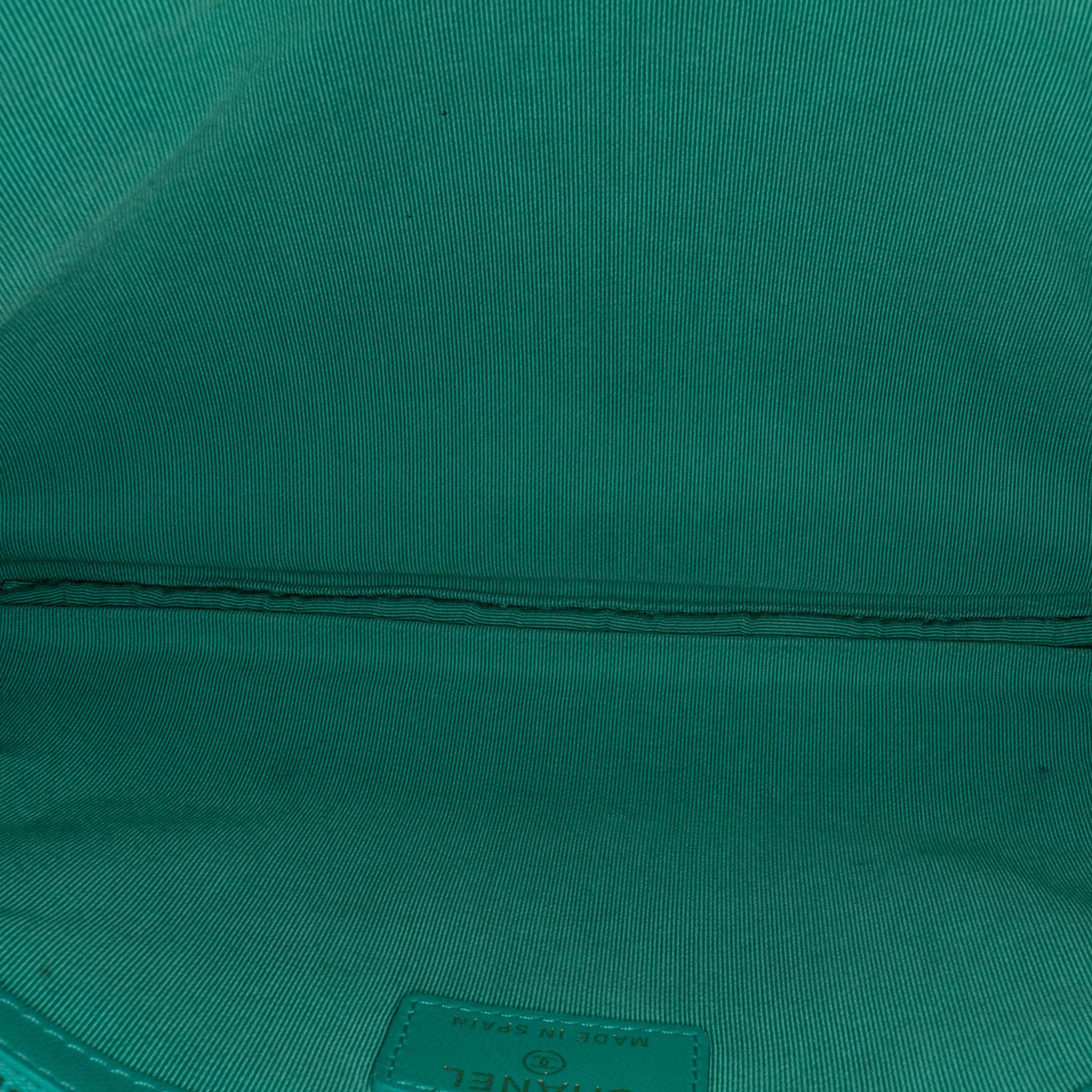 Chanel Quilted Lambskin O-Case Clutch (SHG-2sVTGN)