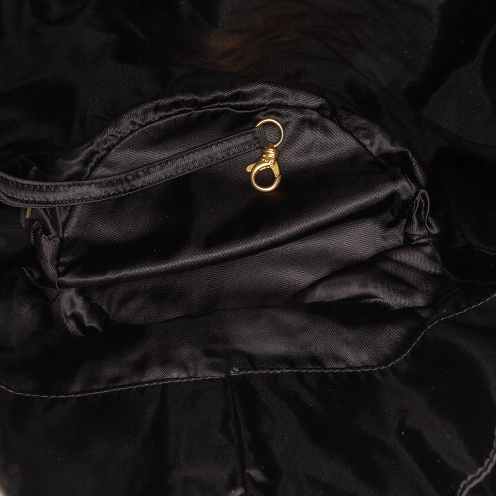 Chanel Quilted Nylon Crystal CC Drawstring Sling Bag