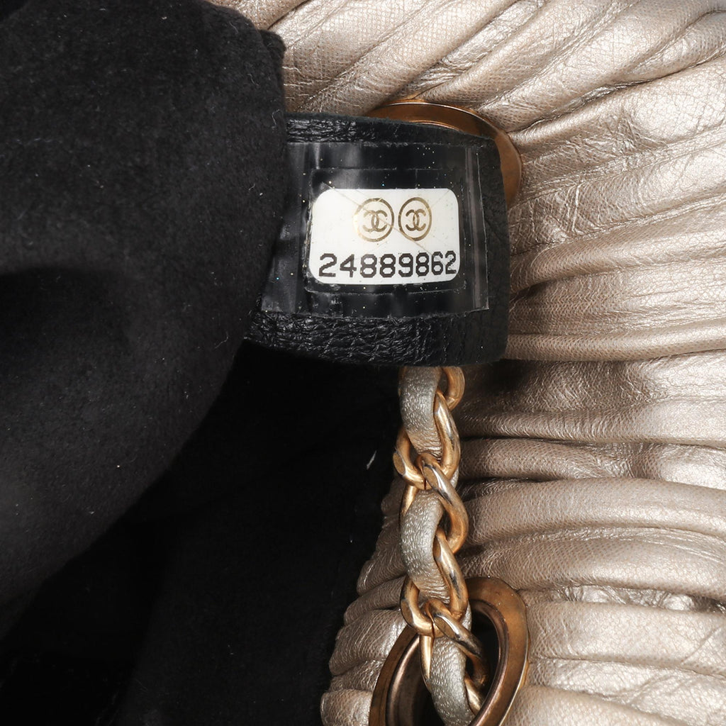 Chanel Small Metallic Calfskin Coco Pleats Drawstring Backpack