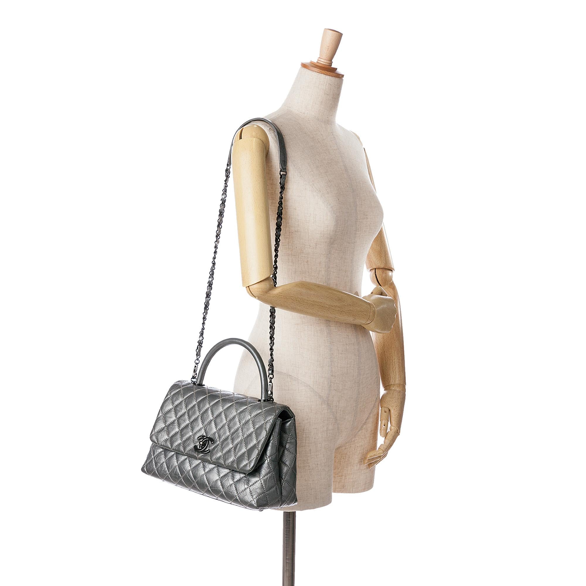 Chanel Small Quilted Aged Calfskin Coco Top Handle Bag
