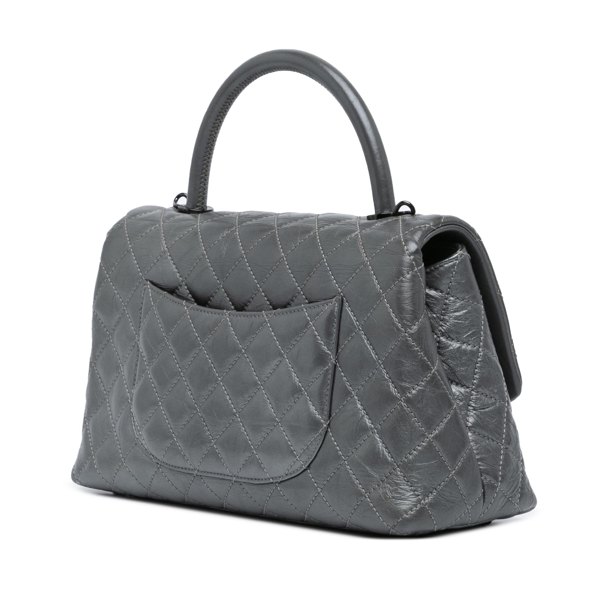 Chanel Small Quilted Aged Calfskin Coco Top Handle Bag