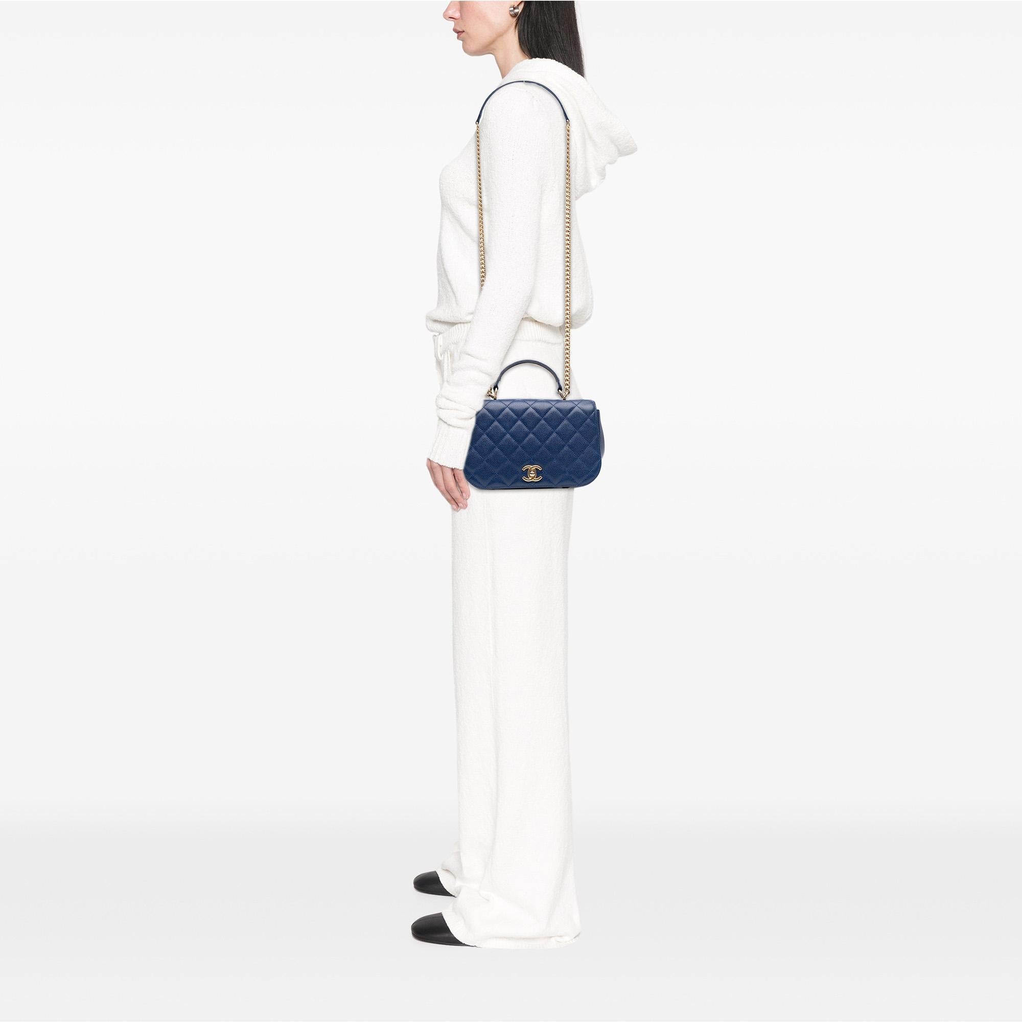 Chanel Small Quilted Caviar Carry Around Flap
