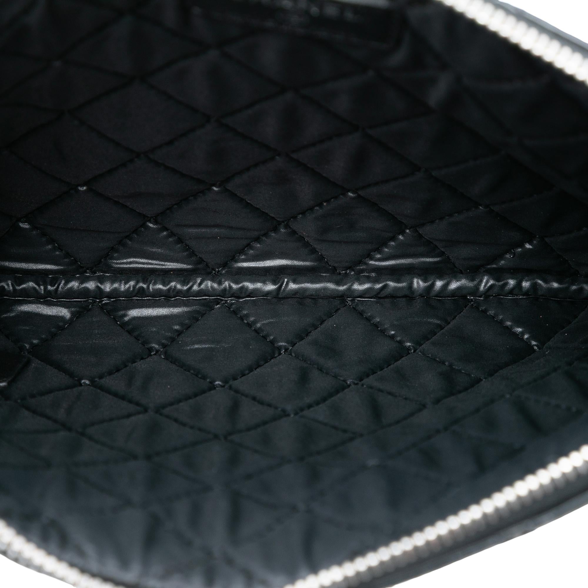 Chanel Small Quilted Patent O Case Clutch