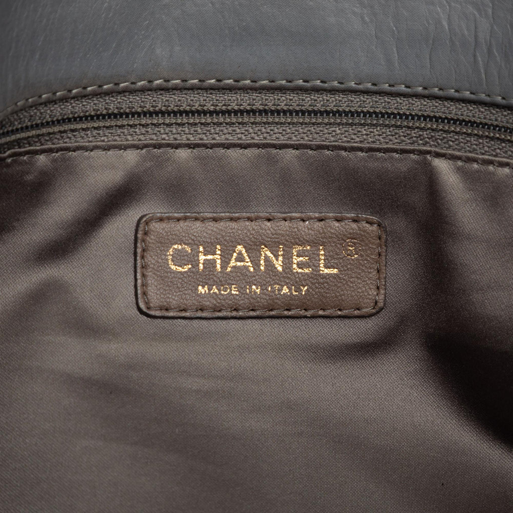 Chanel Vertical Quilted Iridescent Calfskin Mademoiselle Lock Bijoux Flap