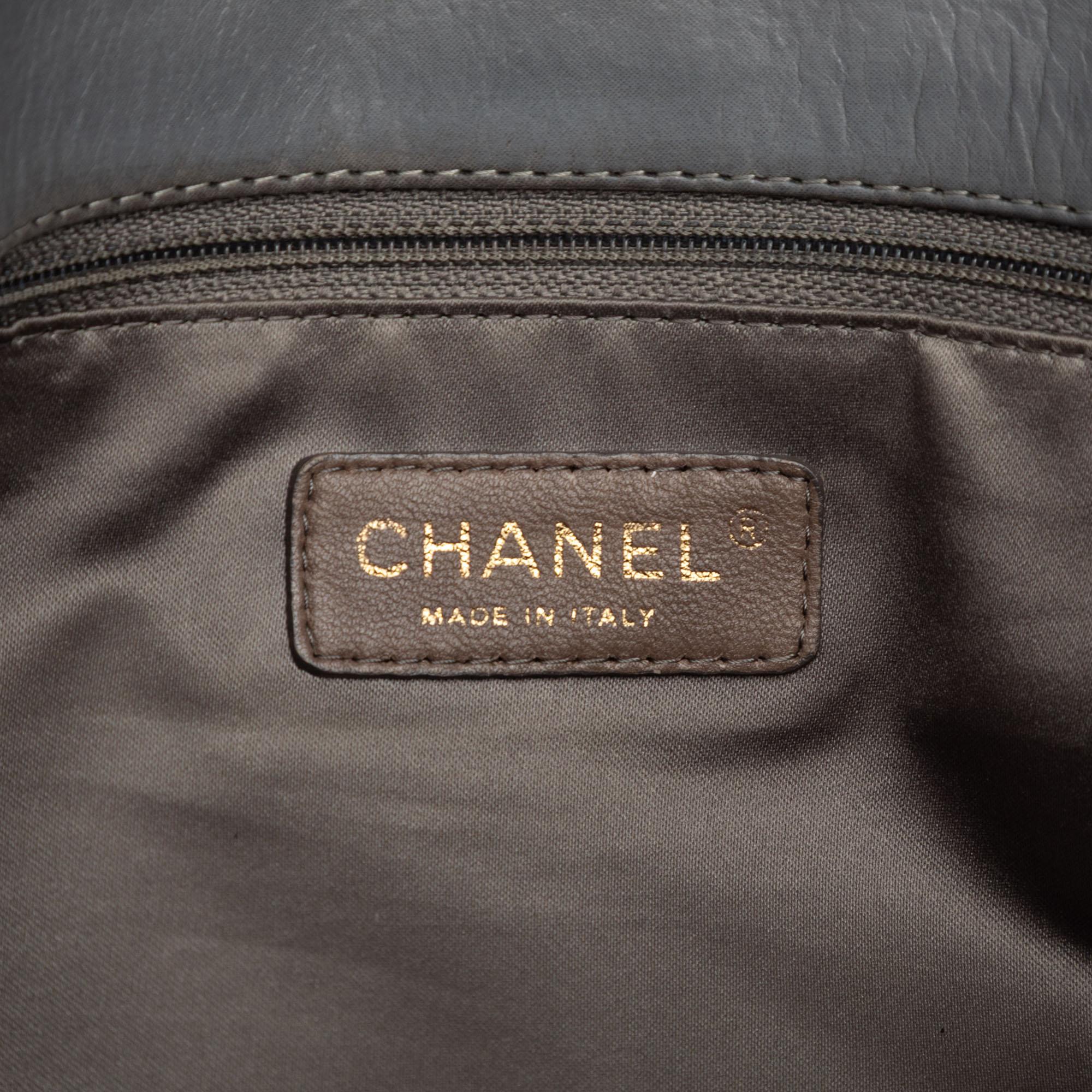 Chanel Vertical Quilted Iridescent Calfskin Mademoiselle Lock Bijoux Flap