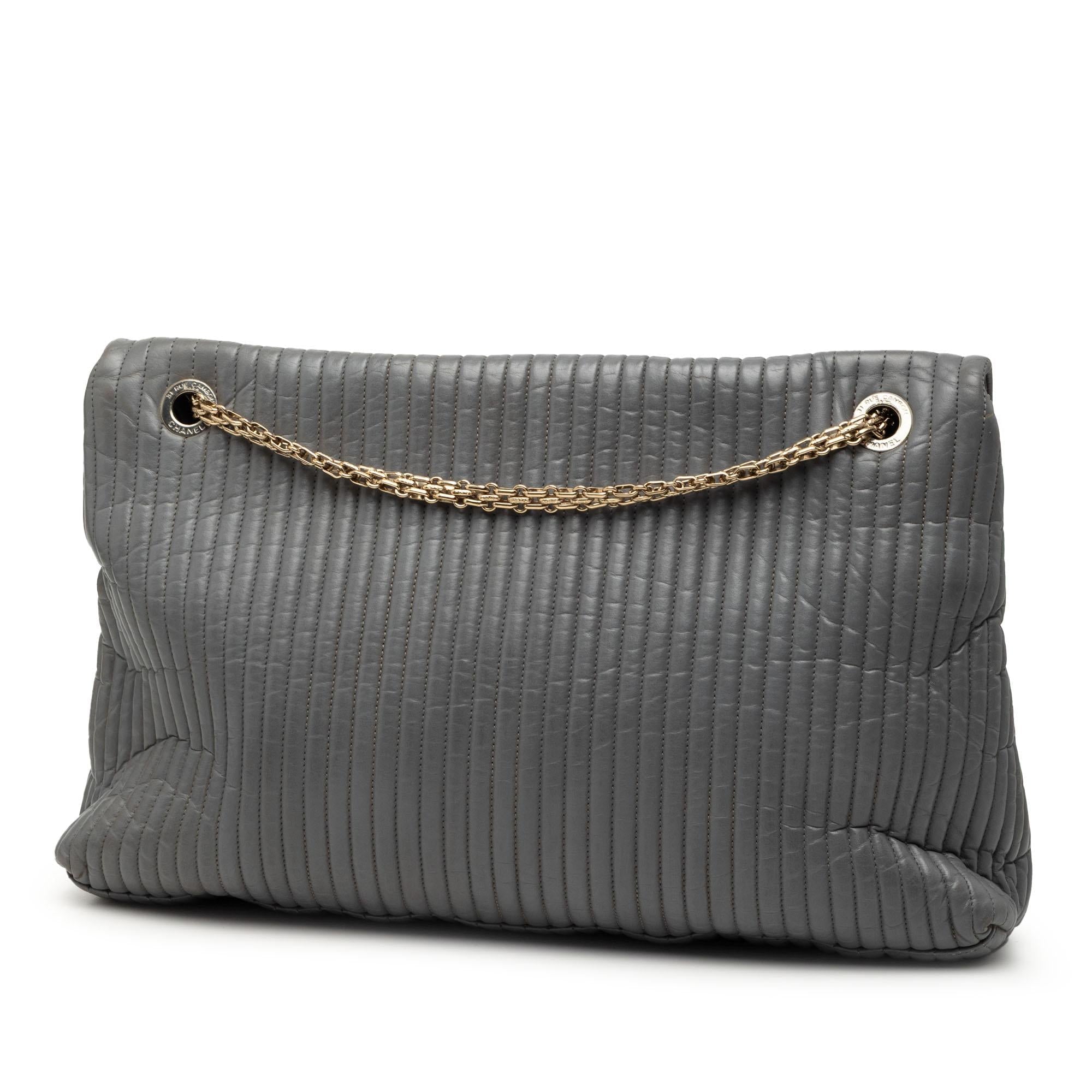 Chanel Vertical Quilted Iridescent Calfskin Mademoiselle Lock Bijoux Flap