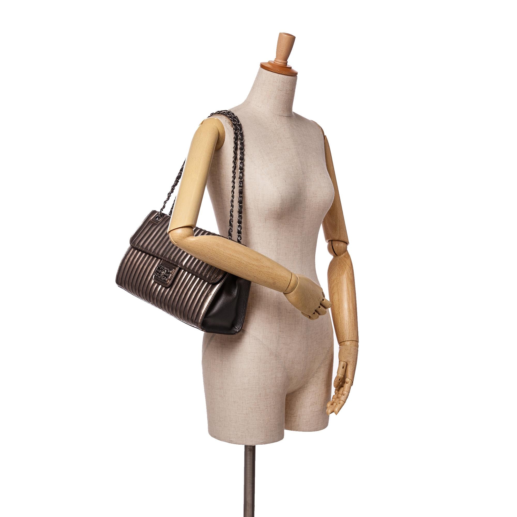 Chanel Vertical Quilted Patent Maharaja Express Flap