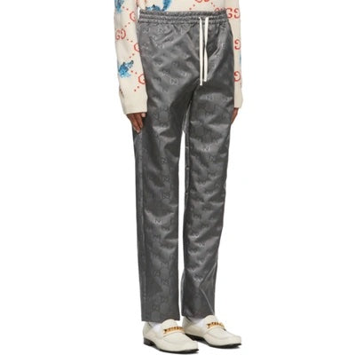 GUCCI OFF THE GRID MONOGRAM LOGO TRACK PANTS