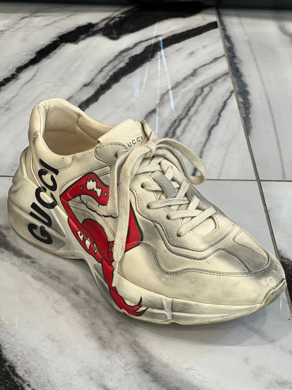 GUCCI DISTRESSED CALFSKIN MOUTH PRINT RHYTON SNEAKERS