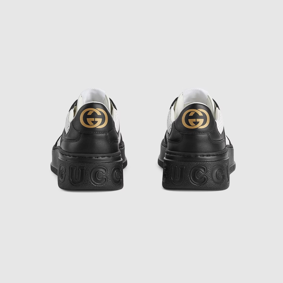 GUCCI GG EMBOSSED LOW-TOP LEATHER SNEAKERS
