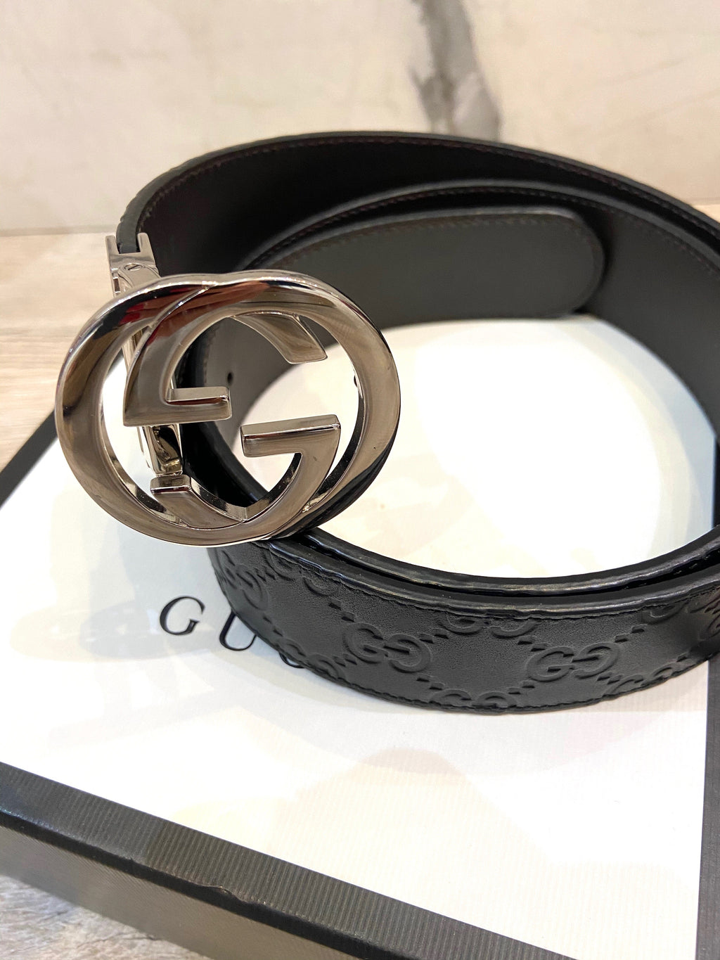 GUCCI INTERLOCKING G EMBOSSED LEATHER BELT