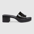 GUCCI EMBOSSED LOGO RUBBER PLATFORM SANDALS