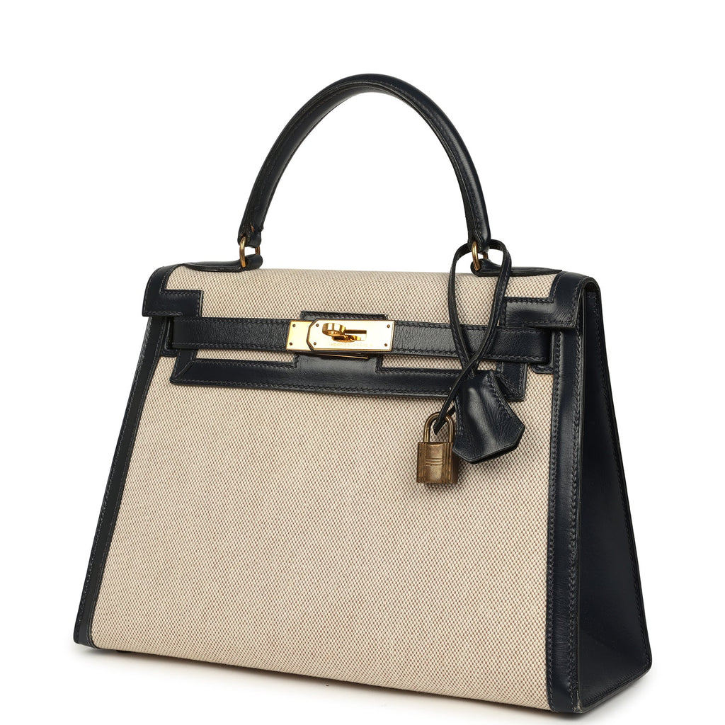 New Hermes Kelly Sellier 28 Bleu Marine Box and Beige-Ecru Toile H Canvas Gold Hardware