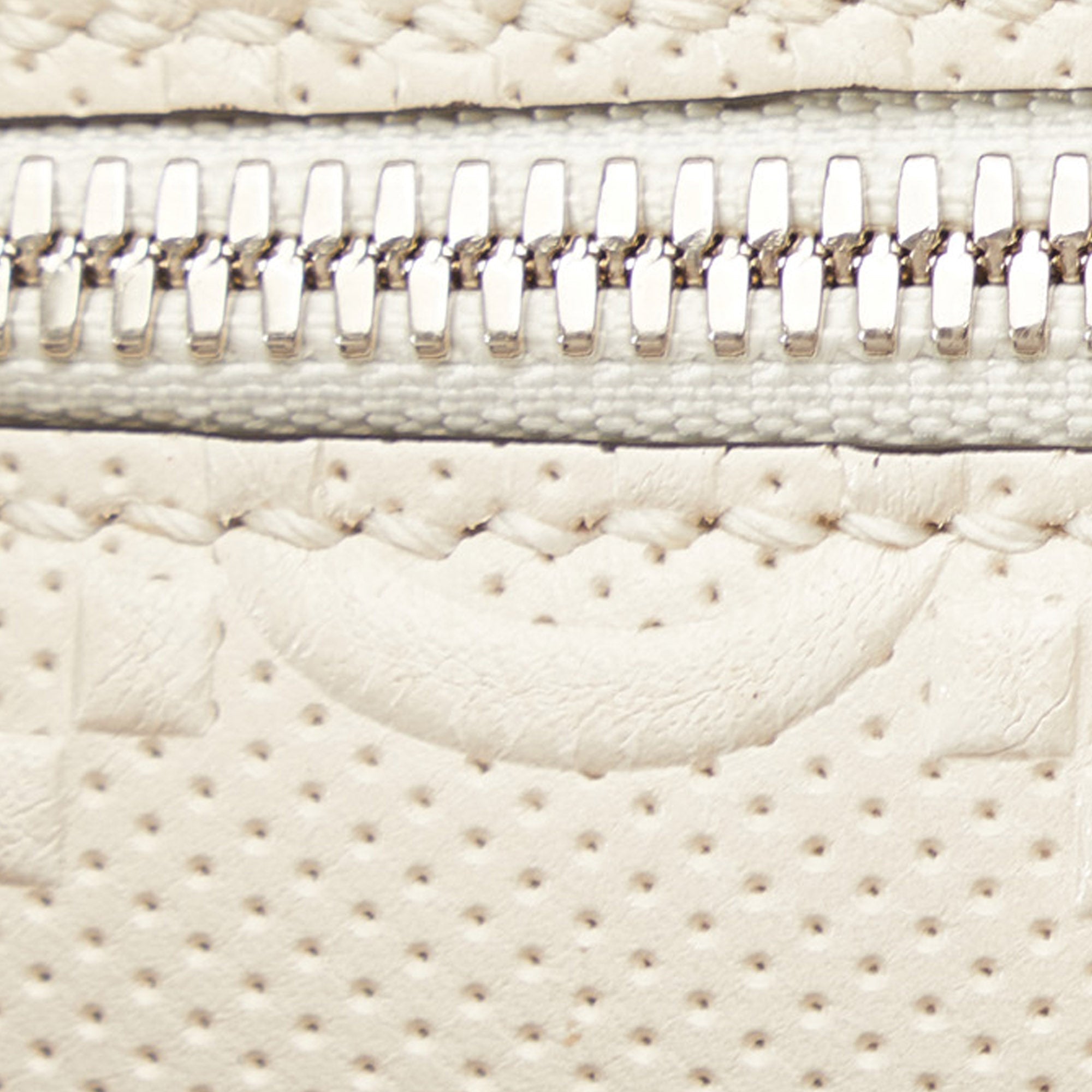 GUCCI GG Embossed Perforated Square Bag