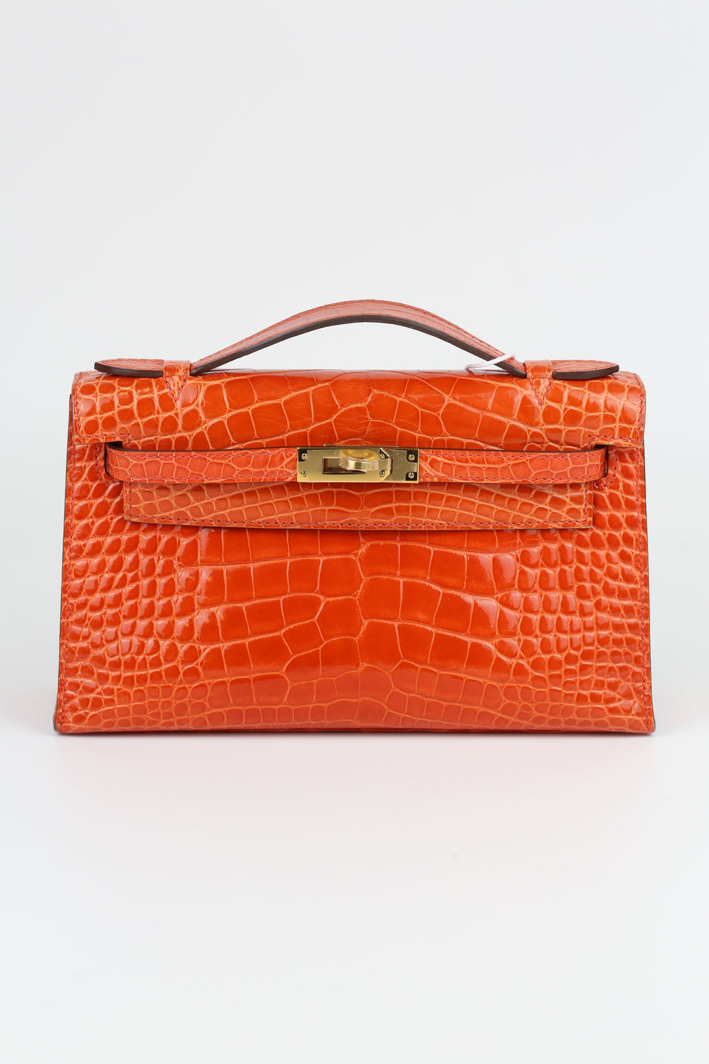 HERMÈS Kelly Pouch Alligator Orange Gold