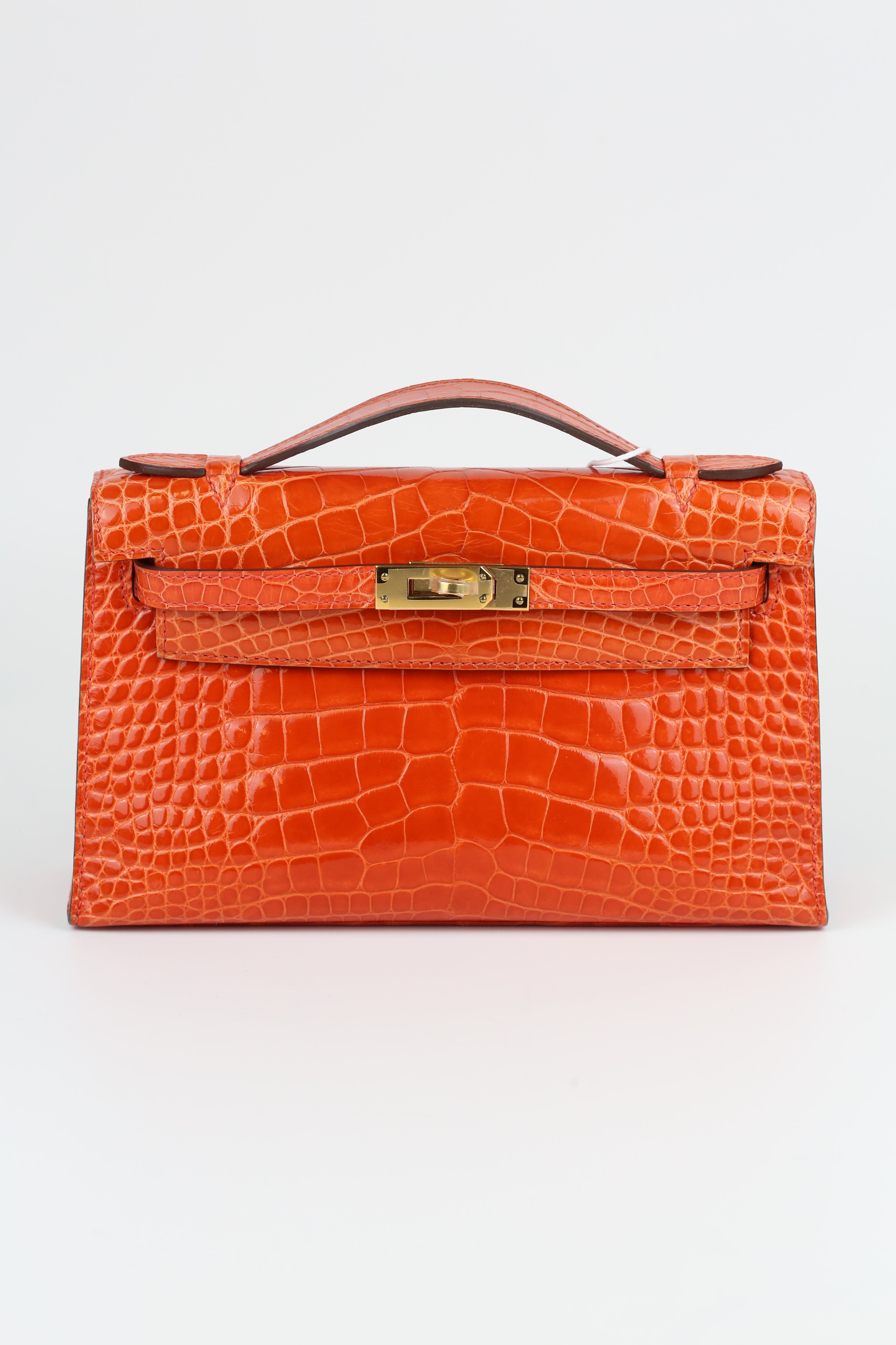 HERMÈS Kelly Pouch Alligator Orange Gold