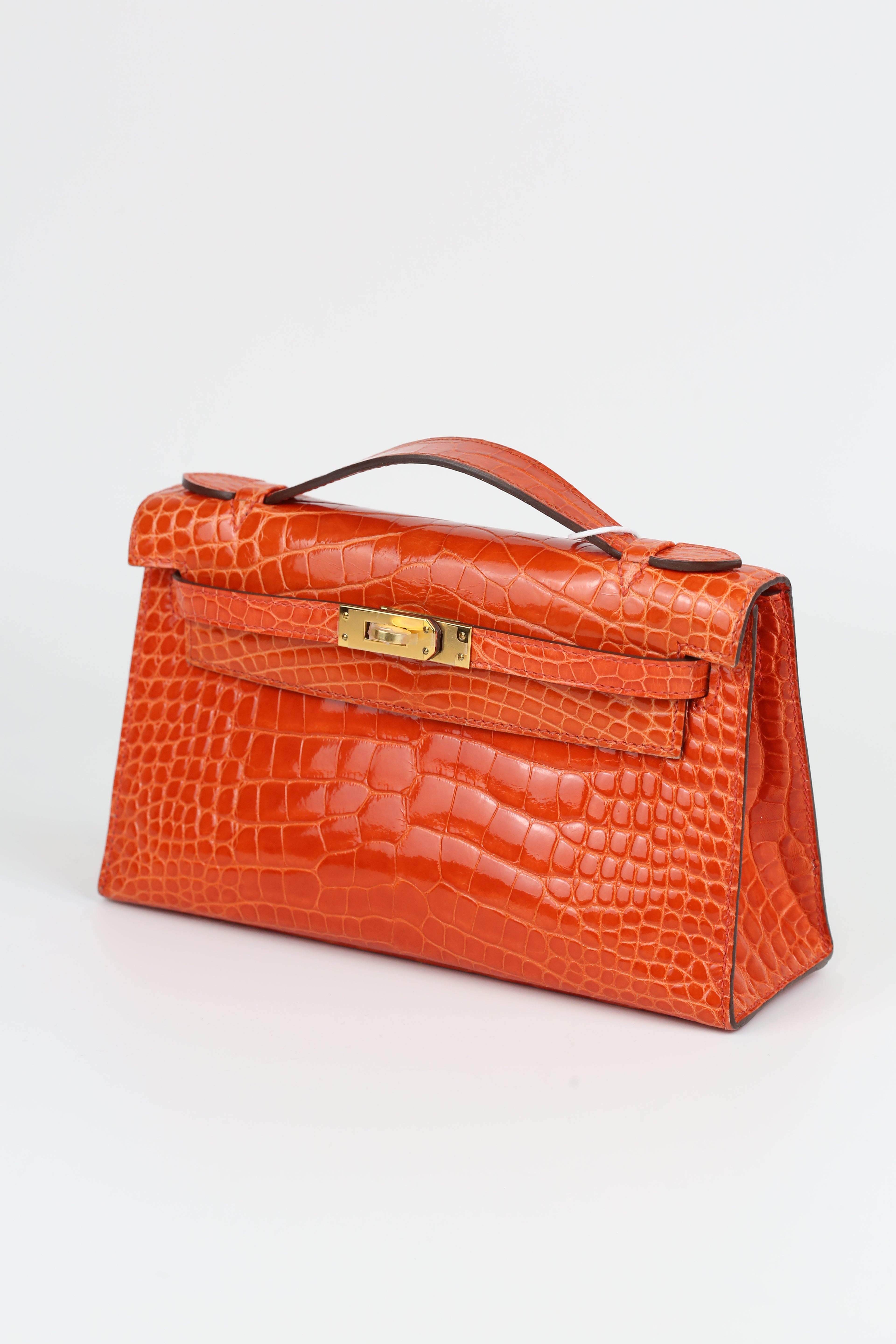 HERMÈS Kelly Pouch Alligator Orange Gold