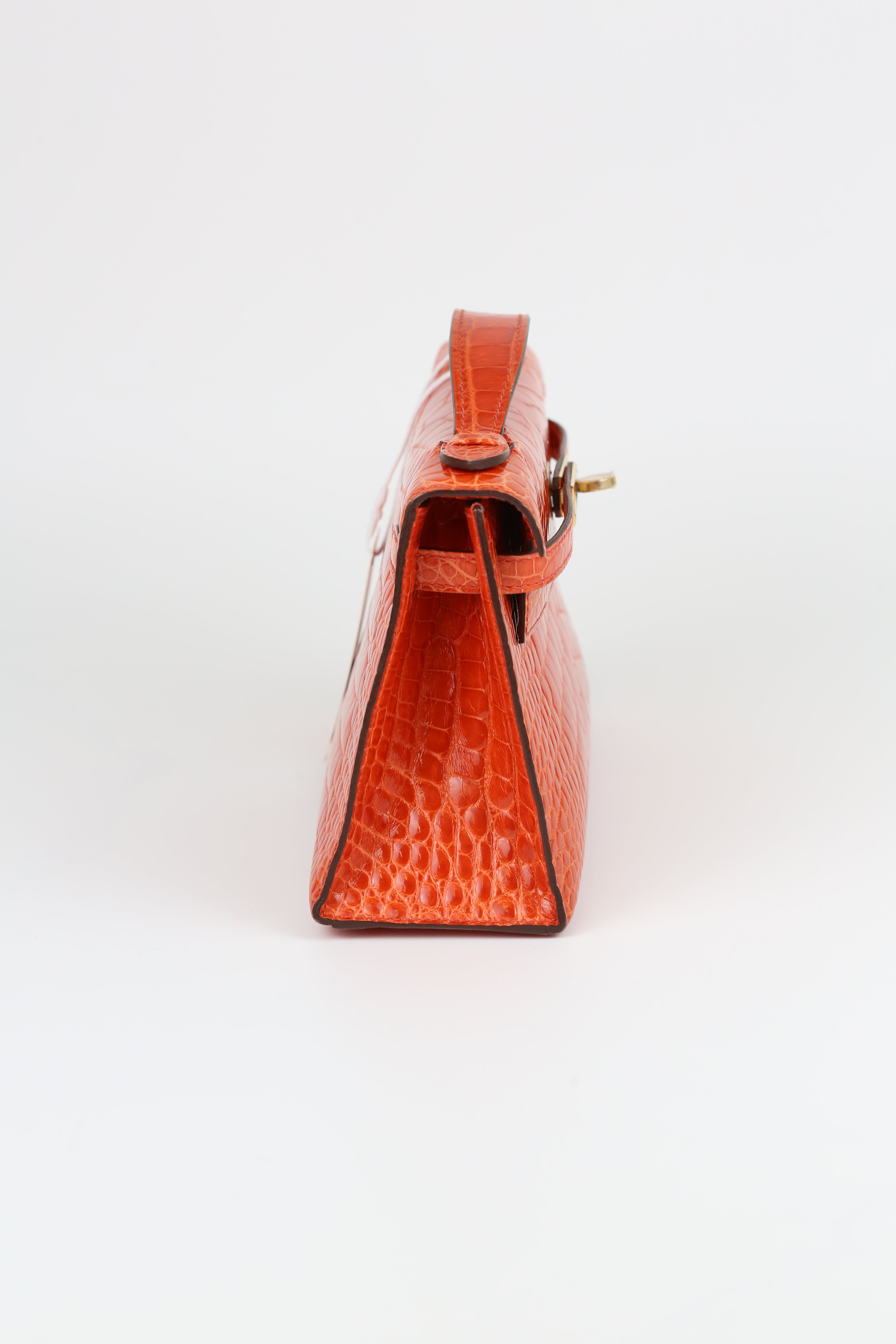 HERMÈS Kelly Pouch Alligator Orange Gold