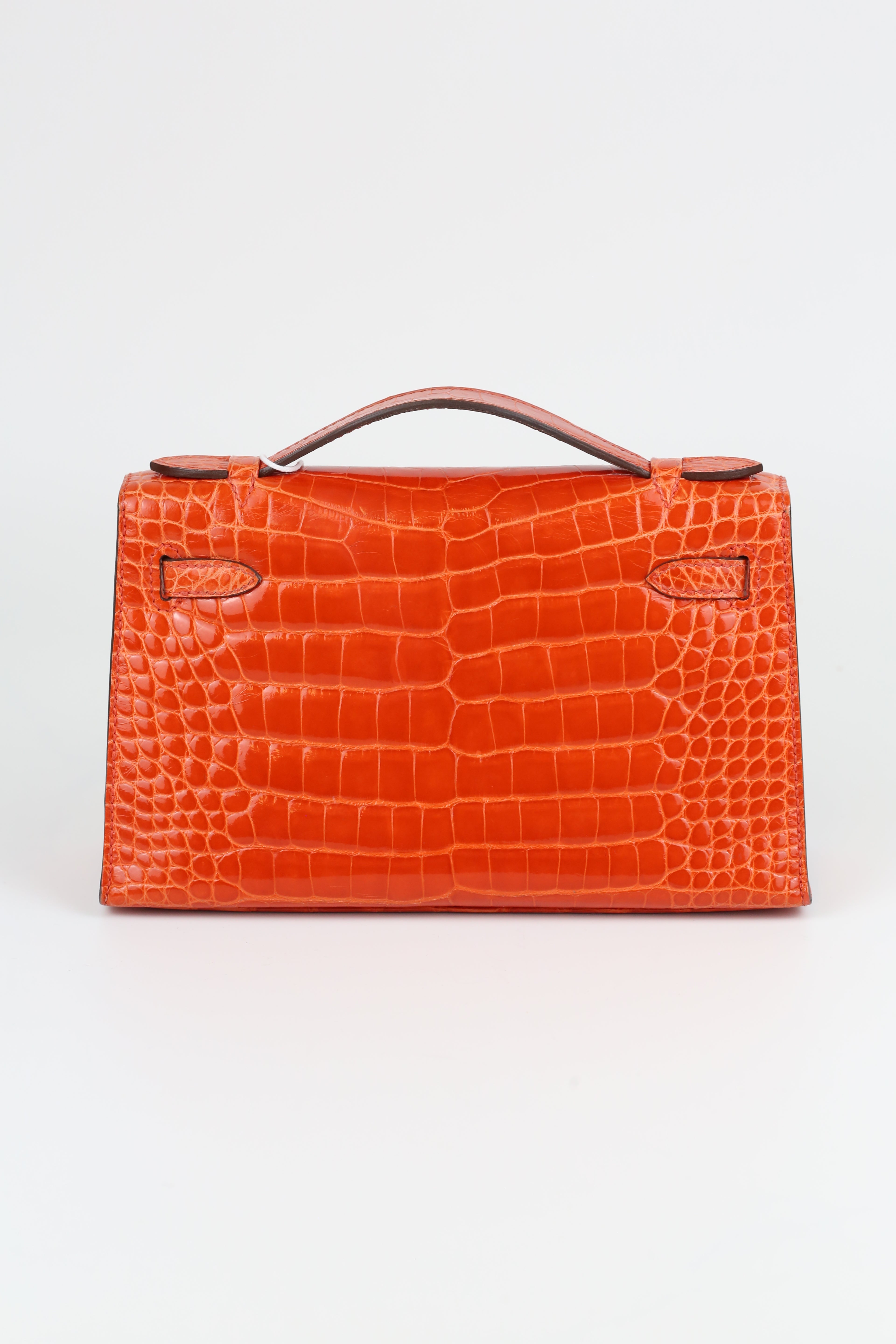 HERMÈS Kelly Pouch Alligator Orange Gold