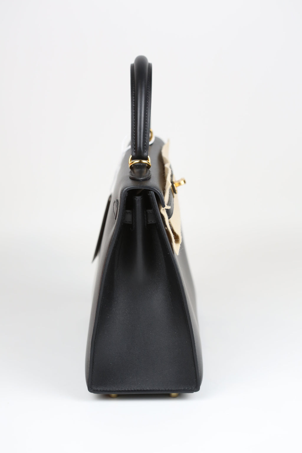 HERMÈS Kelly 25 Noir Gold Tadelakt